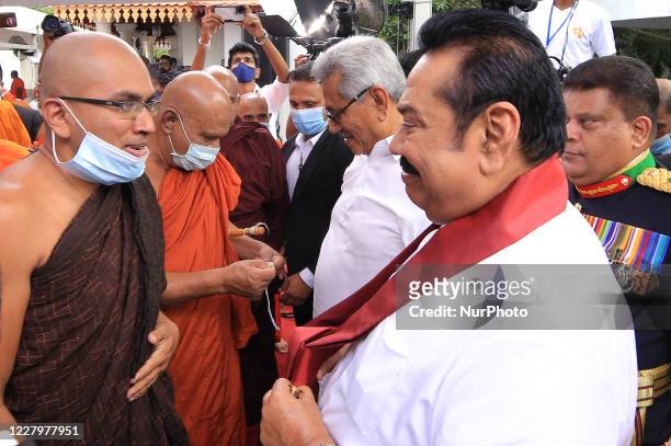 Sri Lankan president Gotabaya Rajapaksa and newly sworn in prime minister Mahinda Rajapaksa meet Buddhist monks to receive blessings at Kelaniya Raja...