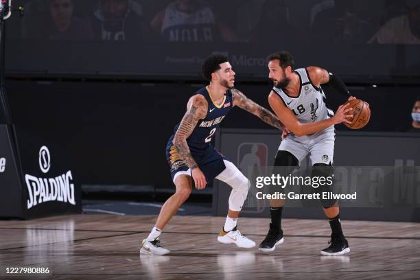 Orlando, FL Marco Belinelli of the San Antonio Spurs handles the ball against the New Orleans Pelicans on August 9, 2020 at The Field House at ESPN...