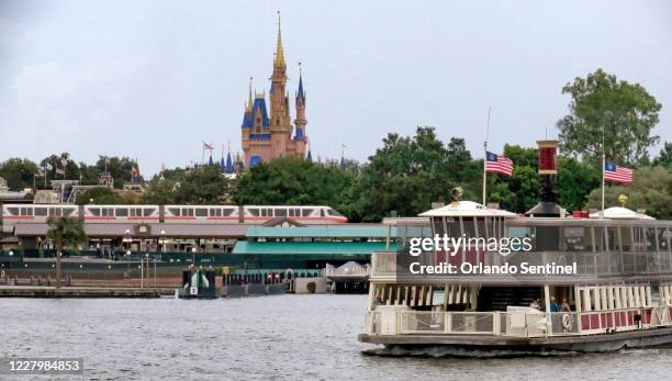 Ferry boats and monorails operate during the official re-opening day of the Magic Kingdom at Walt Disney World on July 11, 2020.