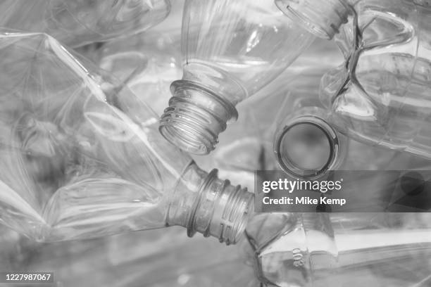 Image has been converted to black and white. Plastic water and drinks bottles for recycling on 1st July 2020 in London, United Kingdom. Single-use...