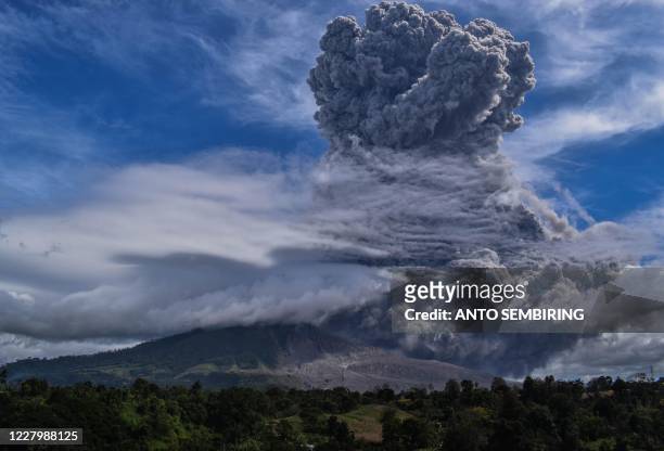Mount Sinabung spews thick ash and smoke into the sky in Karo, North Sumatra on August 10, 2020.