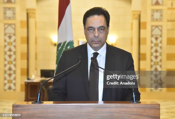 Lebanese Prime Minister Hassan Diab holds a press conference to announce his resignation after the Council of Ministers meeting at the Prime Ministry...