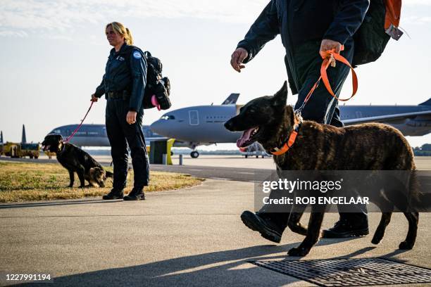 Members of the Dutch Urban Search and Rescue rescue team land at Eindhoven Air Base on August 11 following their mission to Lebanon to help in the...