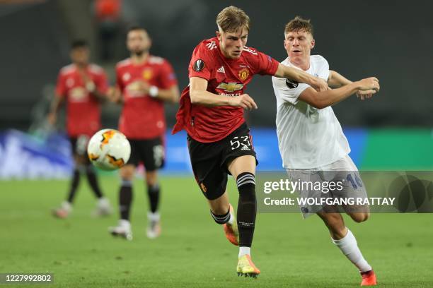 Copenhagen's Spanish midfielder Pep Biel vies with Manchester United's English defender Brandon Williams during the UEFA Europa League quarter-final...
