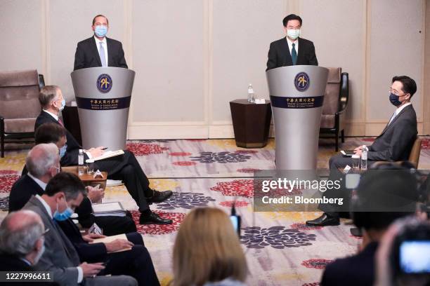 Alex Azar, secretary of Health and Human Services , top left, and Joseph Wu, Taiwan's foreign minister, top right, attend a news conference in...