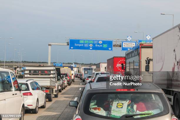 Trucks, cars, campers, and caravans standing in giant traffic jam due the summer trips are seen at a highway near Budapest , Hungary, on 5 August 2020