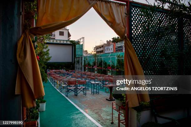 Picture taken on August 10, 2020 shows the projection venue of the open-air cinema "Palace" in Athens. - Real institutions of the Athenian summer,...