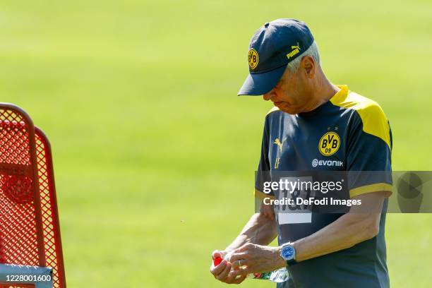 Head coach Lucien Favre of Borussia Dortmund looks on during day 2 of the pre-season summer training camp of Borussia Dortmund on August 11, 2020 in...