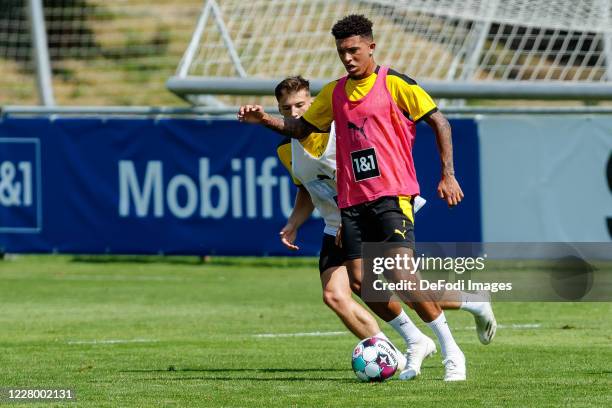 Tobias Raschl of Borussia Dortmund and Jadon Sancho of Borussia Dortmund battle for the ball during day 2 of the pre-season summer training camp of...