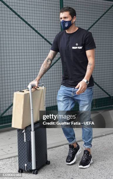 Atletico Madrid defender Jose Maria Gimenez arrives with Atletico Madrid team in Lisbon for the Champions League at Humberto Delgado Airport on...