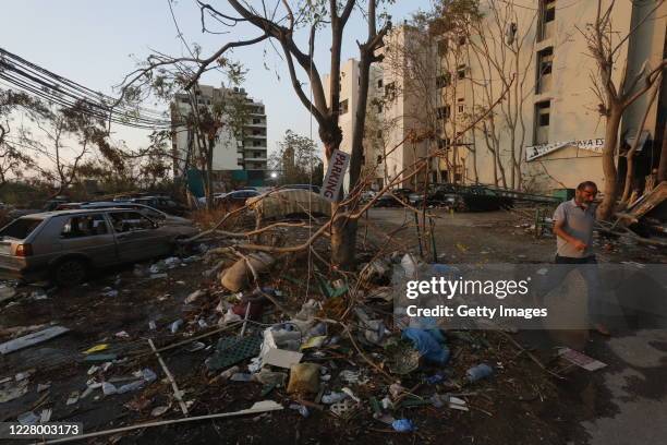 Debris from last week's explosion surrounds a tree on August 11, 2020 in Beirut, Lebanon. Last week's explosion, which killed more than 200 people...