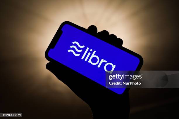 Logo of Libra digital currency is seen displayed on a smartphone in this illustration photo taken in Krakow, Poland on August 2, 2020.