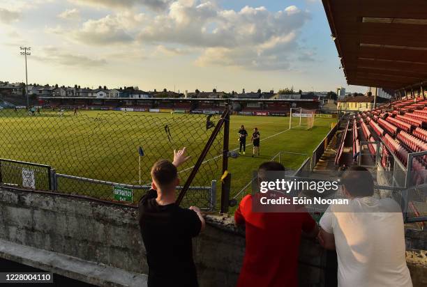 Cork , Ireland - 11 August 2020; Jack Moore, Steven Heaphy and Tim Cronin watch the match from the rooftop in the Corner Flag Bar during the Extra.ie...