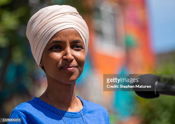 Rep. Ilhan Omar speaks with media gathered outside Mercado Central on August 11, 2020 in Minneapolis, Minnesota. Omar is hoping to retain her seat as...
