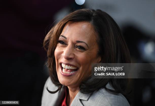 Democratic presidential hopeful California Senator Kamala Harris speaks to the press in the Spin Room after participating in the fifth Democratic...