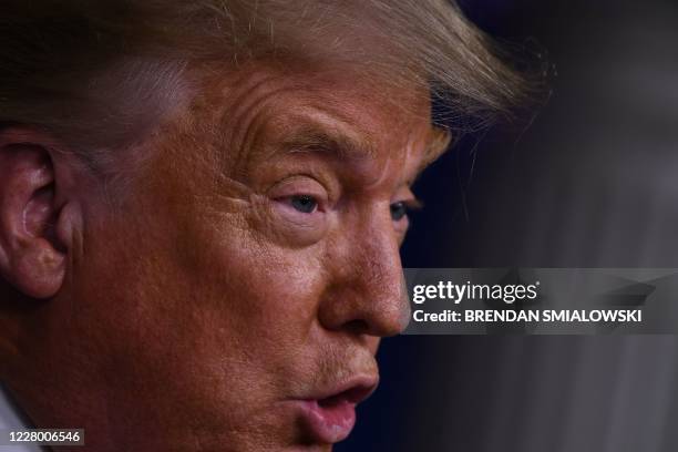 President Donald Trump speaks to the press in the Brady Briefing Room of the White House in Washington, DC, on August 11, 2020.