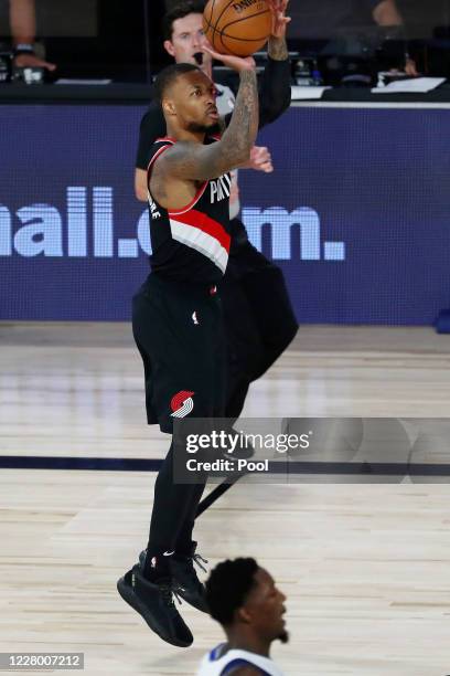 Damian Lillard of the Portland Trail Blazers shoots the ball against the Dallas Mavericks during the second half at The Field House at ESPN Wide...