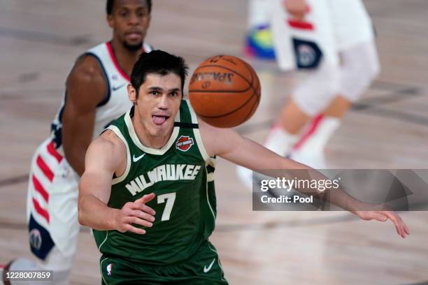 Ersan Ilyasova of the Milwaukee Bucks chases after the loose ball during the first half against the Washington Wizards at Visa Athletic Center at...