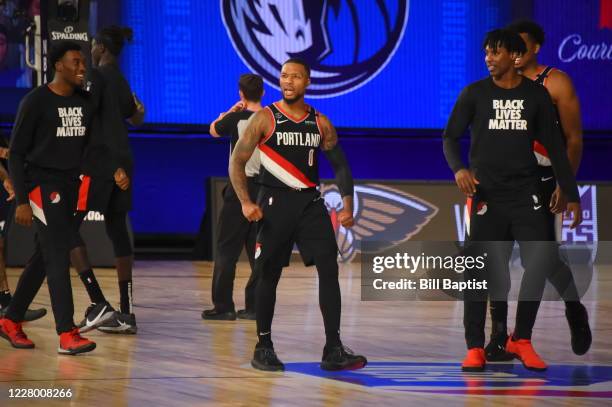 Orlando, FL Damian Lillard of the Portland Trail Blazers reacts to a win against the Dallas Mavericks on August 11, 2020 at The Arena at ESPN Wide...