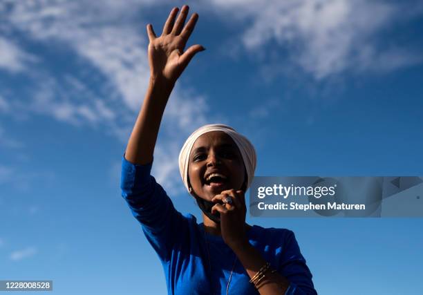 Rep. Ilhan Omar campaigns at the intersection of Broadway Avenue and Central Avenue on August 11, 2020 in Minneapolis, Minnesota. Omar retained her...