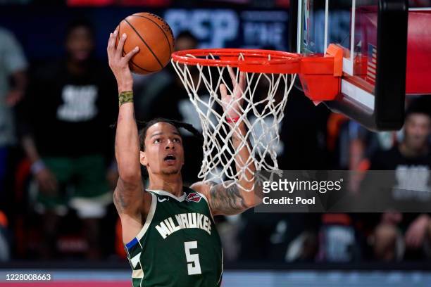 Wilson of the Milwaukee Bucks drives to the basket against the Washington Wizards during the first half at Visa Athletic Center at ESPN Wide World Of...