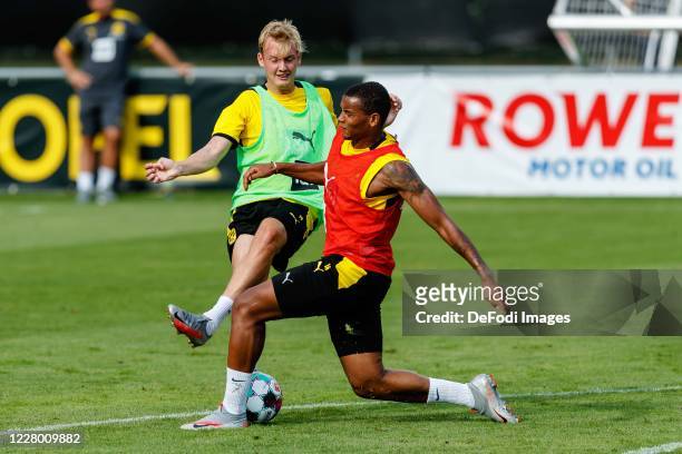 Julian Brandt of Borussia Dortmund and Manuel Akanji of Borussia Dortmund battle for the ball during day 2 of the pre-season summer training camp of...