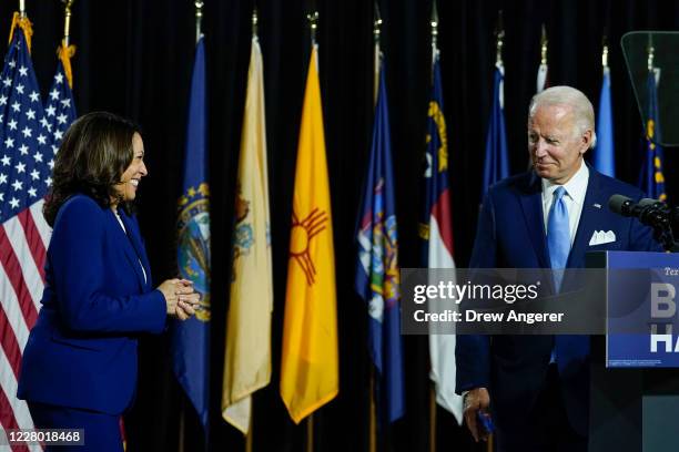 Presumptive Democratic presidential nominee former Vice President Joe Biden invites his running mate Sen. Kamala Harris to the stage to deliver...