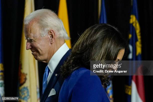 Presumptive Democratic presidential nominee former Vice President Joe Biden invites his running mate Sen. Kamala Harris to the stage to deliver...