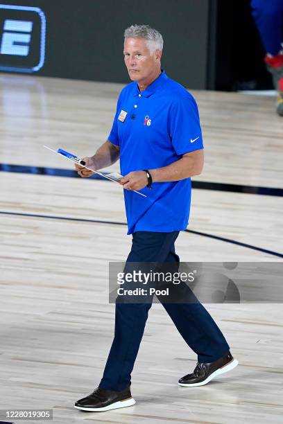 Head coach Brett Brown of the Philadelphia 76ers walks on the court during a timeout in the first half at The Field House at ESPN Wide World Of...
