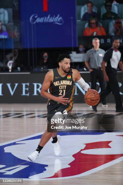 Orlando, FL Andre Roberson of the Oklahoma City Thunder handles the ball during the game against the Miami Heat on August 12, 2020 at The Visa...