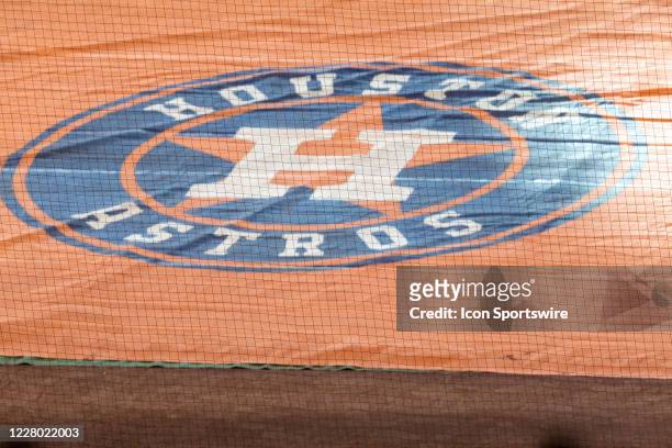 Houston Astros logo on the field prior to an MLB baseball game between the Houston Astros and the San Francisco Giants on August 11, 2020 at Minute...