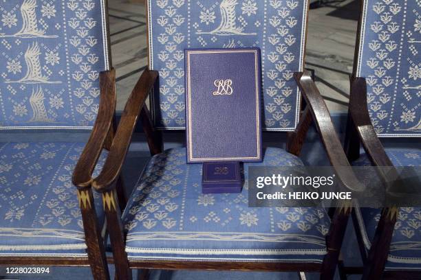 The empty chair with a diploma and medal that should have been awarded to this year's Nobel Peace Prize winner Liu Xiaobo stands in Oslo City Hall on...