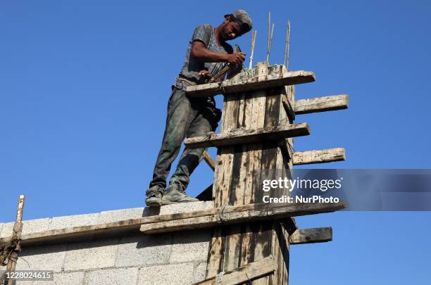 Palestinian worker at the construction site of a building in Gaza City, Palestine, on August 13, 2020. Israel attacked Hamas targets in Gaza and...