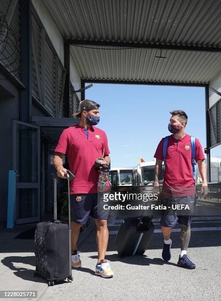 Barcelona forward Lionel Messi and Barcelona forward Luis Suarez arrive with Barcelona team in Lisbon for the Champions League at Humberto Delgado...