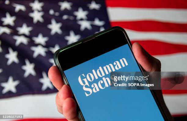 In this photo illustration the American multinational investment bank and financial services company Goldman Sachs logo is seen on an Android mobile...