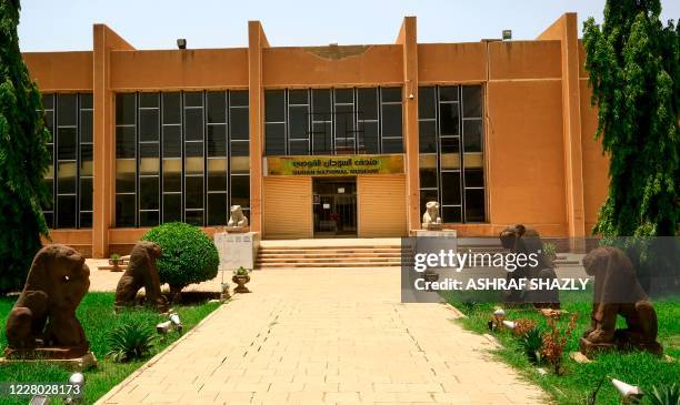 This picture taken on August 12 shows the entrance of the Sudan National Museum in the capital Khartoum. - The Sudan Museum, which houses thousands...