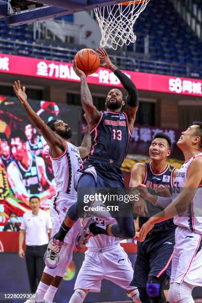 Sonny Weems of Guangdong Southern Tigers takes a shot during the Chinese Basketball Association match with Liaoning Flying Leopards in Qingdao in...