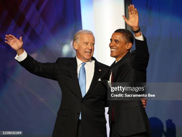 In this file photo, Democratic presidential candidate Barack Obama joins his running mate, vice presidential candidate Joe Biden, following Biden's...