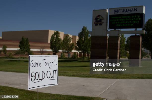 Game sold out sign is displayed at the front of Herriman High School on August 13, 2020 in Herriman, Utah. This is the first high school football...