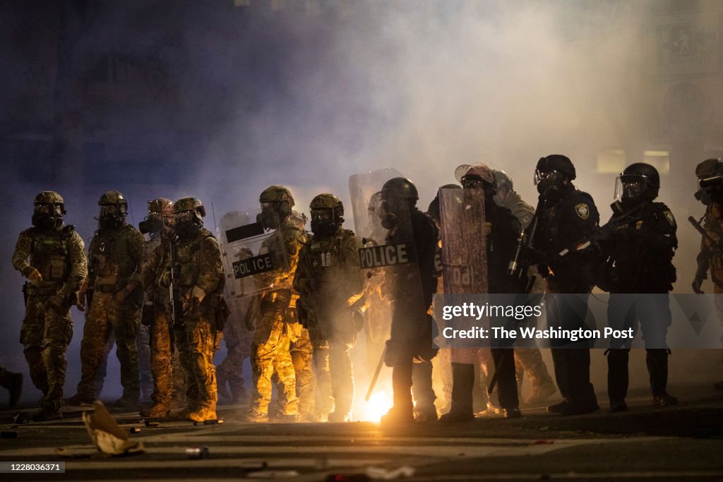 PORTLAND, OR - JULY 26:  Federal officers and Portland riot pol