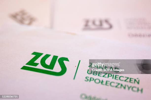 In this photo illustration a ZUS logo seen on the correspondence received from the Social Insurance Institution. The Social Insurance Institution is...