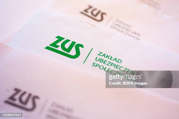 In this photo illustration a ZUS logo seen on the correspondence received from the Social Insurance Institution. The Social Insurance Institution is...