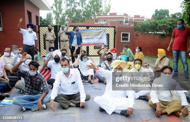 Leader of opposition Harpal Cheema joins a protest by the Punjabi University Teachers Association in front of VC BS Ghumans Residence at Punjabi...