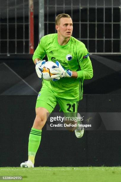 Goalkeeper Karl-Johan Johnsson of FC Kopenhagen controls the ball during the UEFA Europa League Quarter Final between Manchester United and FC...