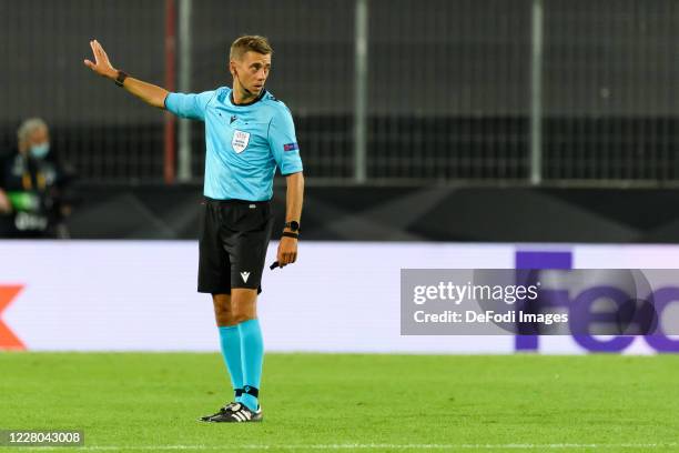 Referee Franzose Clement Turpin gestures during the UEFA Europa League Quarter Final between Manchester United and FC Kobenhavn at...