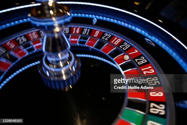 Roulette wheel spins at The Rialto casino on August 14, 2020 in London, England. Enhanced safety and cleaning measures are put in place as Grosvenor...