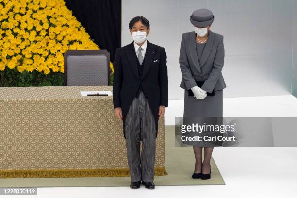 Emperor Naruhito and Empress Masako of Japan wearing face masks, attend a memorial service marking the 75th anniversary of Japan's surrender in World...