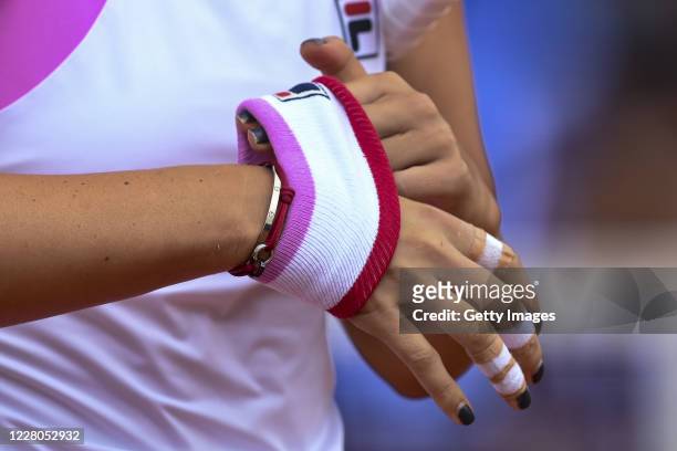 Irina-Camelia Begu of Romania, wristband detail, competes in her Women's Singles Quarter Final match against Sara Sorribes Tormo of Spain during the...