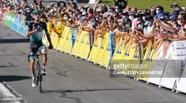 Team Bora rider Germany's Lennard Kamna celebrates as he crosses the finish line at the end of the fourth stage of the 72nd edition of the Criterium...