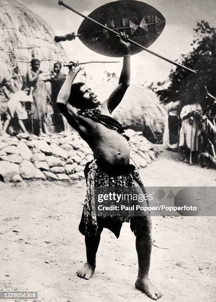 Zulu witch doctor invoking rain in South Africa, circa 1930.